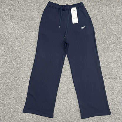 ALO Accolade Straight Leg Sweatpant in Navy front view with chrome logo detail