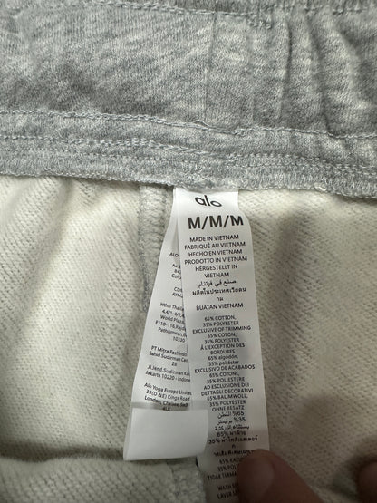 ALO Accolade Athletic Heather Grey sweatpant care label and fabric information detail
