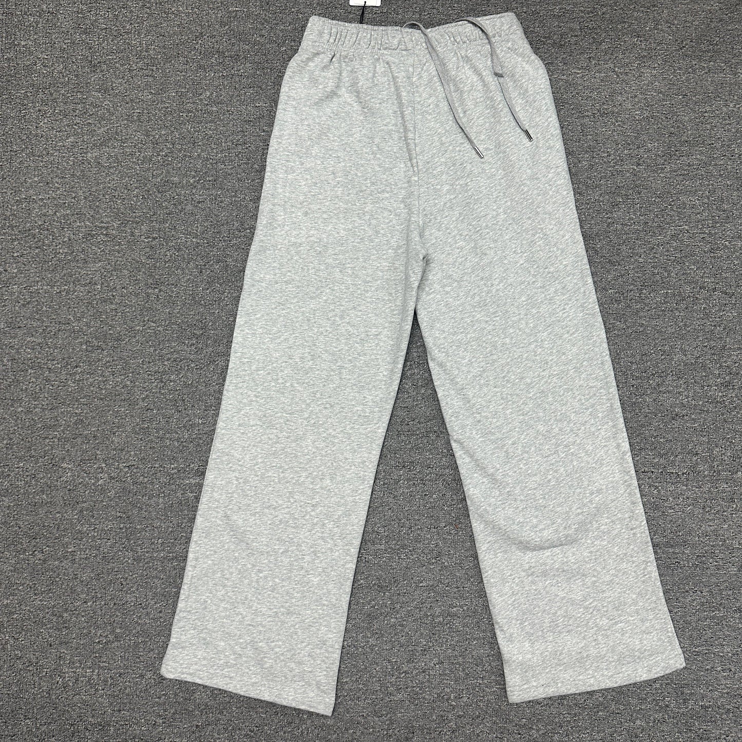 ALO Accolade Athletic Heather Grey sweatpant back view showing the relaxed straight-leg fit