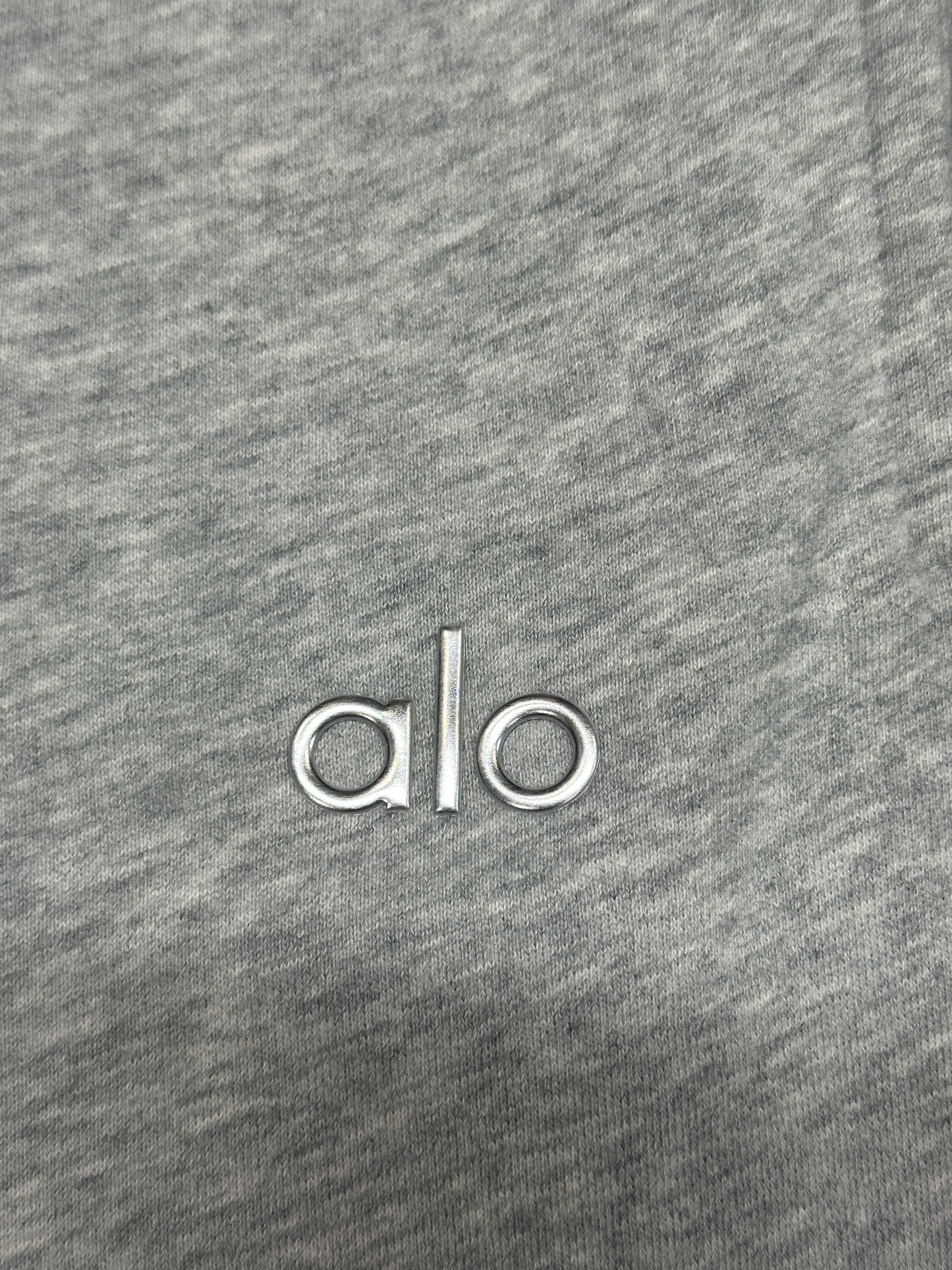 Alo Yoga Left Thigh Embroidered Logo Close-Up Detail
