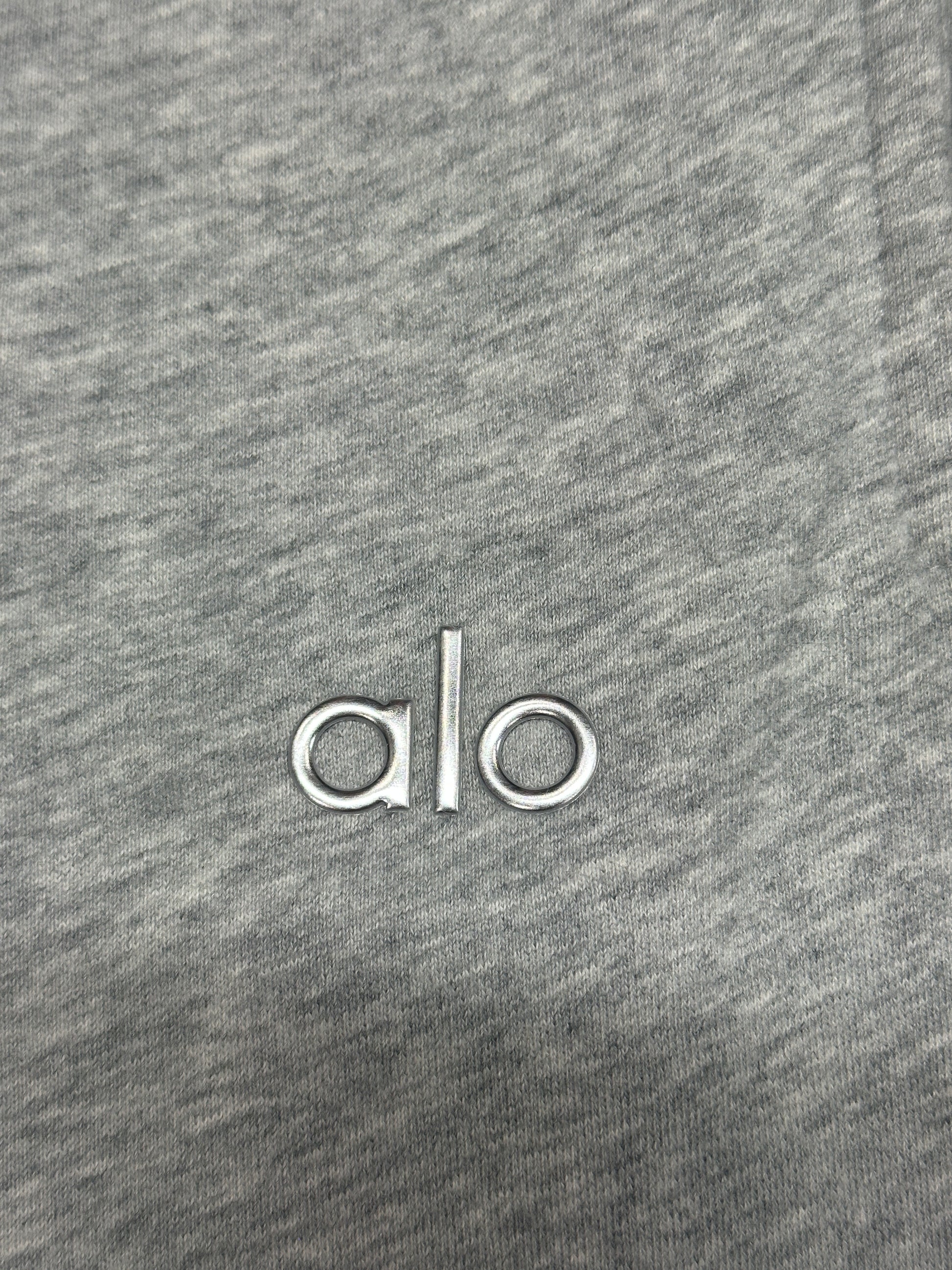 Alo Yoga Left Thigh Embroidered Logo Close-Up Detail
