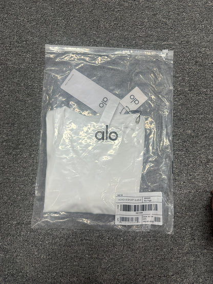 ALO Alosoft White crop tee folded inside branded packaging bag