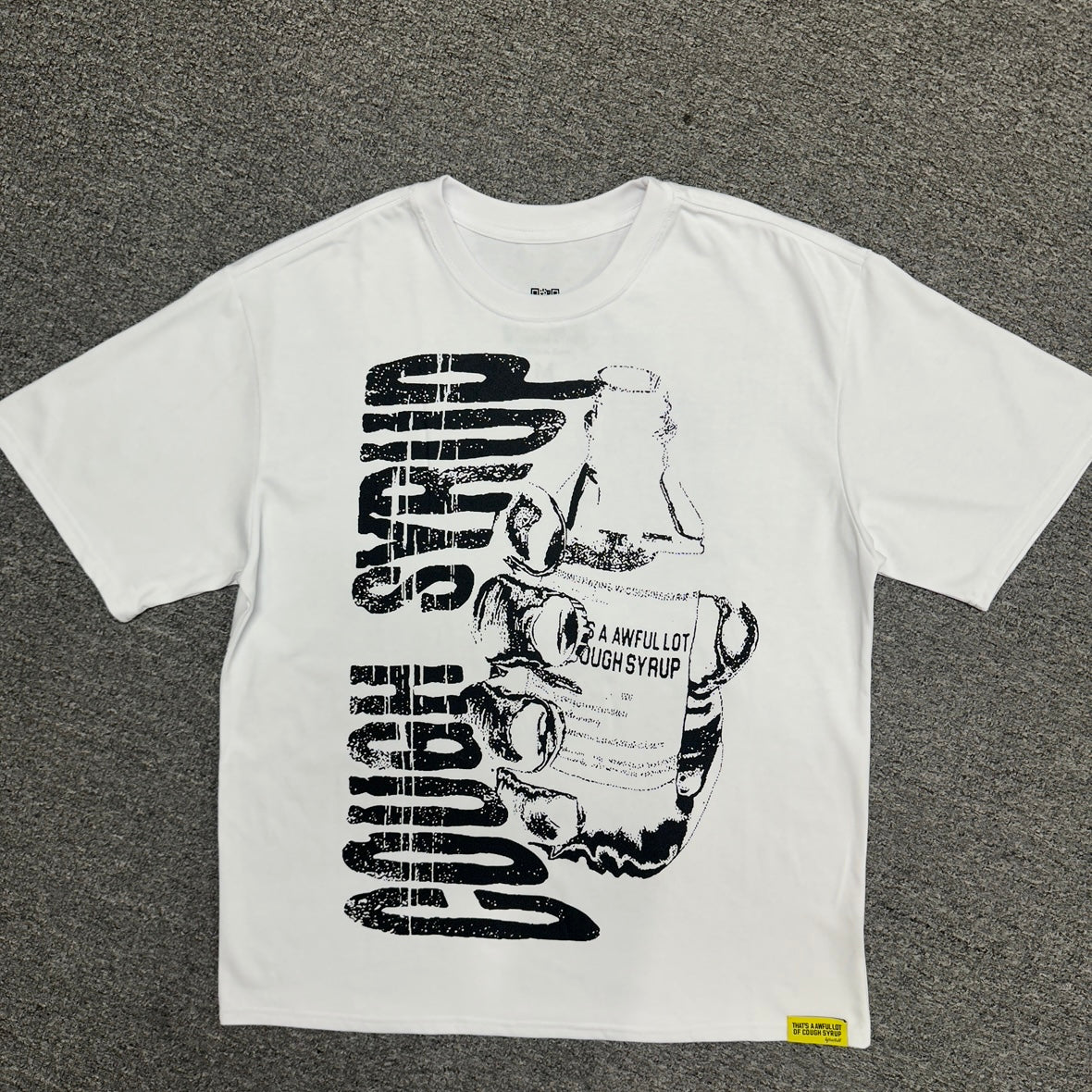 The "Hand Holding Bottle" graphic t-shirt