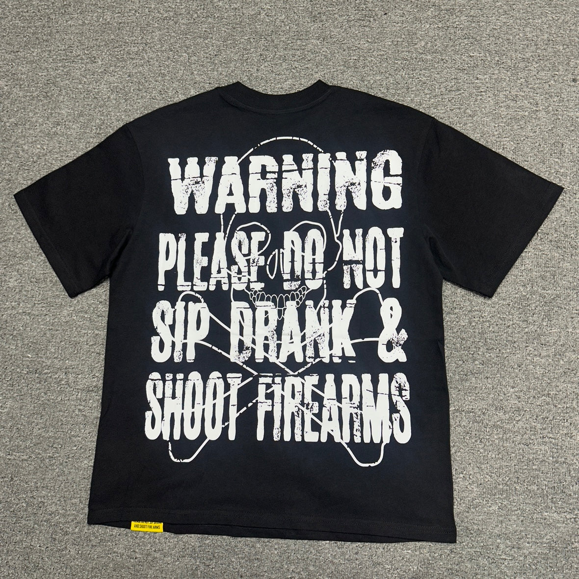The "Hand Holding Bottle" graphic t-shirt