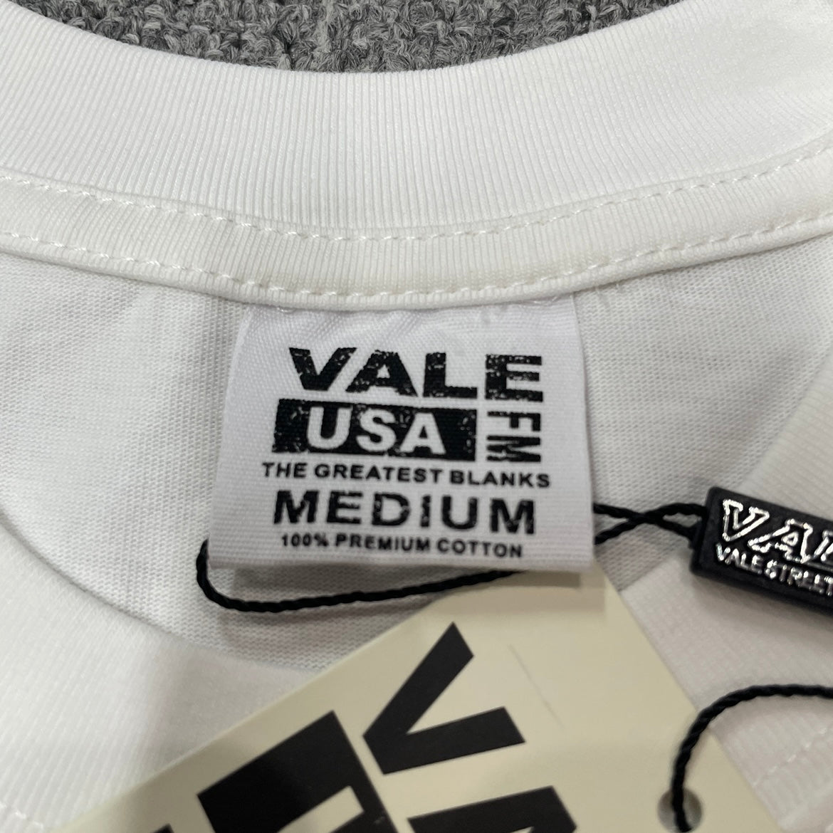 Vale Forever Valley Dreams Alien Tee reinforced crew neck stitching detail
Vale Forever Valley Dreams Alien T-Shirt branded neck label detail
Vale Forever Valley Dreams Alien Graphic Tee size label close-up