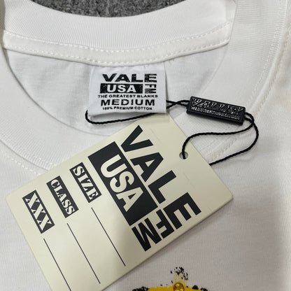 Vale Forever Valley Dreams Alien T-Shirt branded neck label detail
Vale Forever Valley Dreams Alien Graphic Tee size label close-up
Vale Forever Valley Dreams Alien Rhinestone Tee branded hang tag detail
