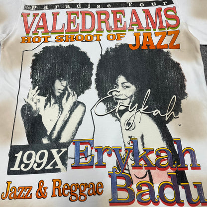Vale Forever Badu Tee full Erykah Badu front graphic print
Vale Forever Badu Tee with Erykah Badu portraits and jazz inspired graphics
Vale Forever Badu Tee vintage tour poster graphic detail
Erykah Badu dual portrait print detail on Vale Forever cream tee
Vale Dreams Jazz and Reggae multicolor lettering print detail
Vale Forever Badu Tee cream distressed vintage wash detail