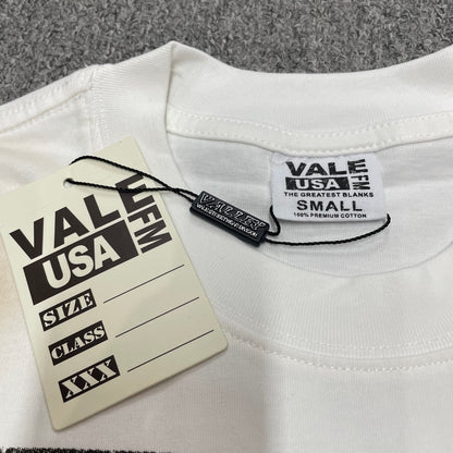 Vale Forever Badu Tee reinforced crew neck stitching detail
Vale Forever Badu Tee branded neck label close-up
Vale Forever Badu Tee Cream size label detail
Vale Forever Badu Tee branded hang tag detail