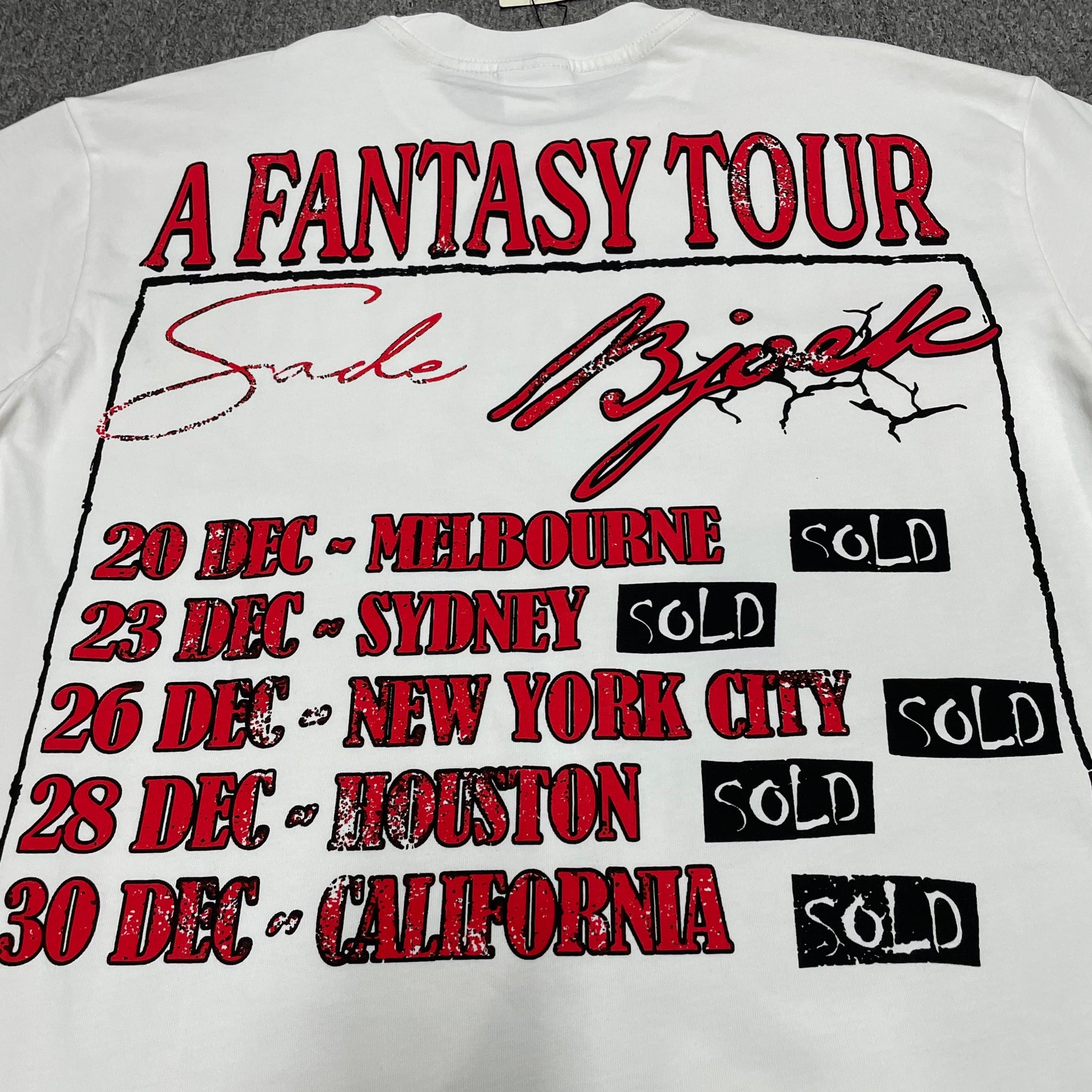 Vale Forever Dreams Tour Tee full fantasy tour dates back graphic
Vale Forever Dreams Tour Tee A Fantasy Tour back print
A Fantasy Tour distressed red title print close-up
Vale Forever Dreams Tour Tee tour cities and dates back print detail
Vale Forever Fantasy Tour black SOLD stamp graphic detail