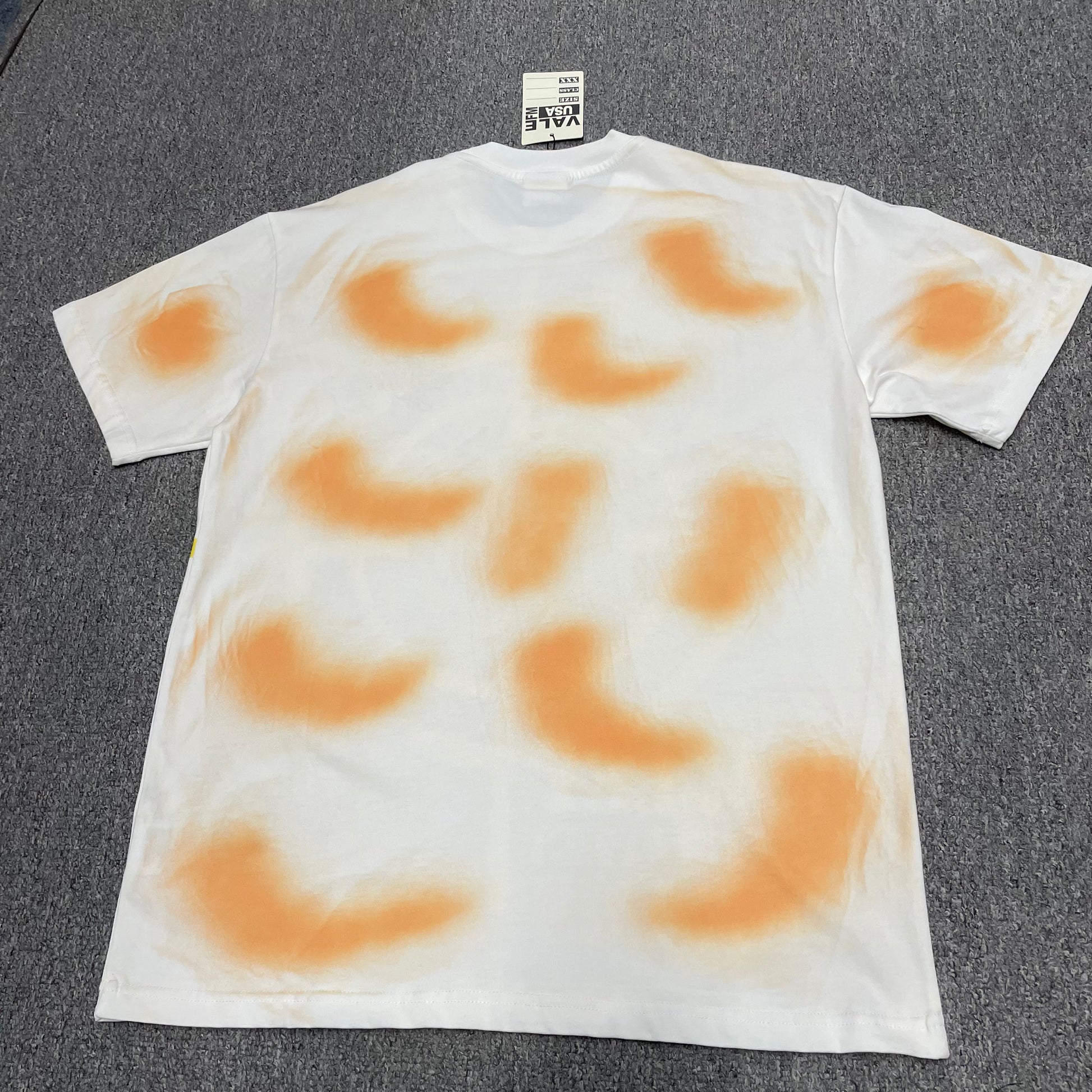 Vale Forever Target Tee Cream back view with orange spray-wash details