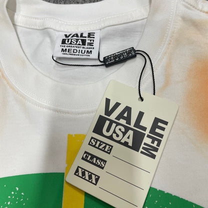 Vale Forever Target Tee reinforced crew neck stitching detail
Vale Forever Target Tee branded neck label close-up
Vale Forever Target Tee Cream size label detail
Vale Forever Target Tee branded hang tag detail
