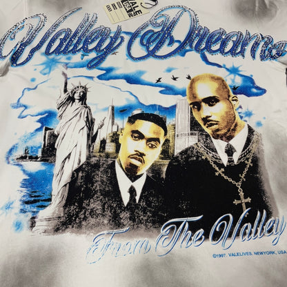 Vale Forever Godfather Bling Tee distressed portrait print close-up
Vale Forever Godfather Bling Tee blue jeweled Valley Dreams lettering
Vale Forever Godfather Bling Tee sparkling crystal lettering detail
Vale Forever Godfather Bling Tee distressed dual portrait graphic detail
Vale Forever Godfather Bling Tee New York skyline print detail
Vale Forever Godfather Bling Tee blue sky and flying birds graphic detail
Vale Forever Godfather Bling Tee From The Valley script print detail