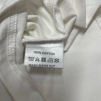 Vale Forever Destroyer King Tee double stitched bottom hem detail
Vale Forever Destroyer King Tee wash care label close-up