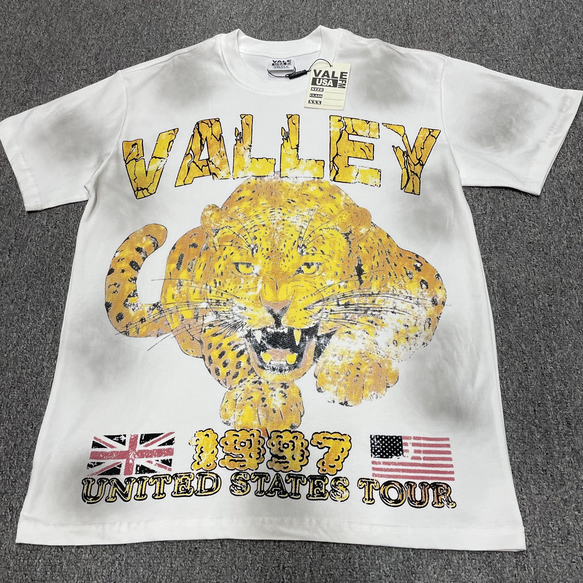 Vale Forever Cheetah Tee White front view with yellow animal graphic