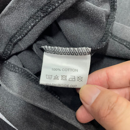 Vale Forever Heaven Boxer Tee double stitched bottom hem detail
Vale Forever Heaven Boxer Tee wash care label close-up