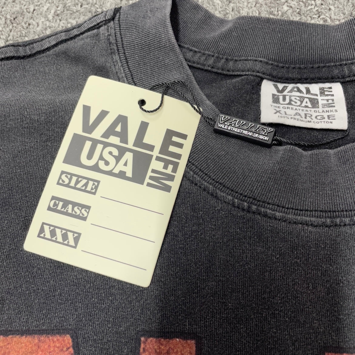 Vale Forever Heaven Boxer Tee crew neck stitching detail
Vale Forever Heaven Boxer Tee branded neck label close-up
Vale Forever Heaven Boxer Tee size label detail
Vale Forever Heaven Boxer Tee branded hang tag detail