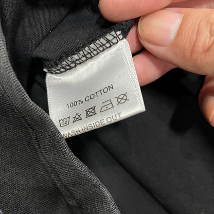 Vale Forever Marvins Dreams Tee double stitched bottom hem detail
Vale Forever Marvins Dreams Tee wash care label close-up