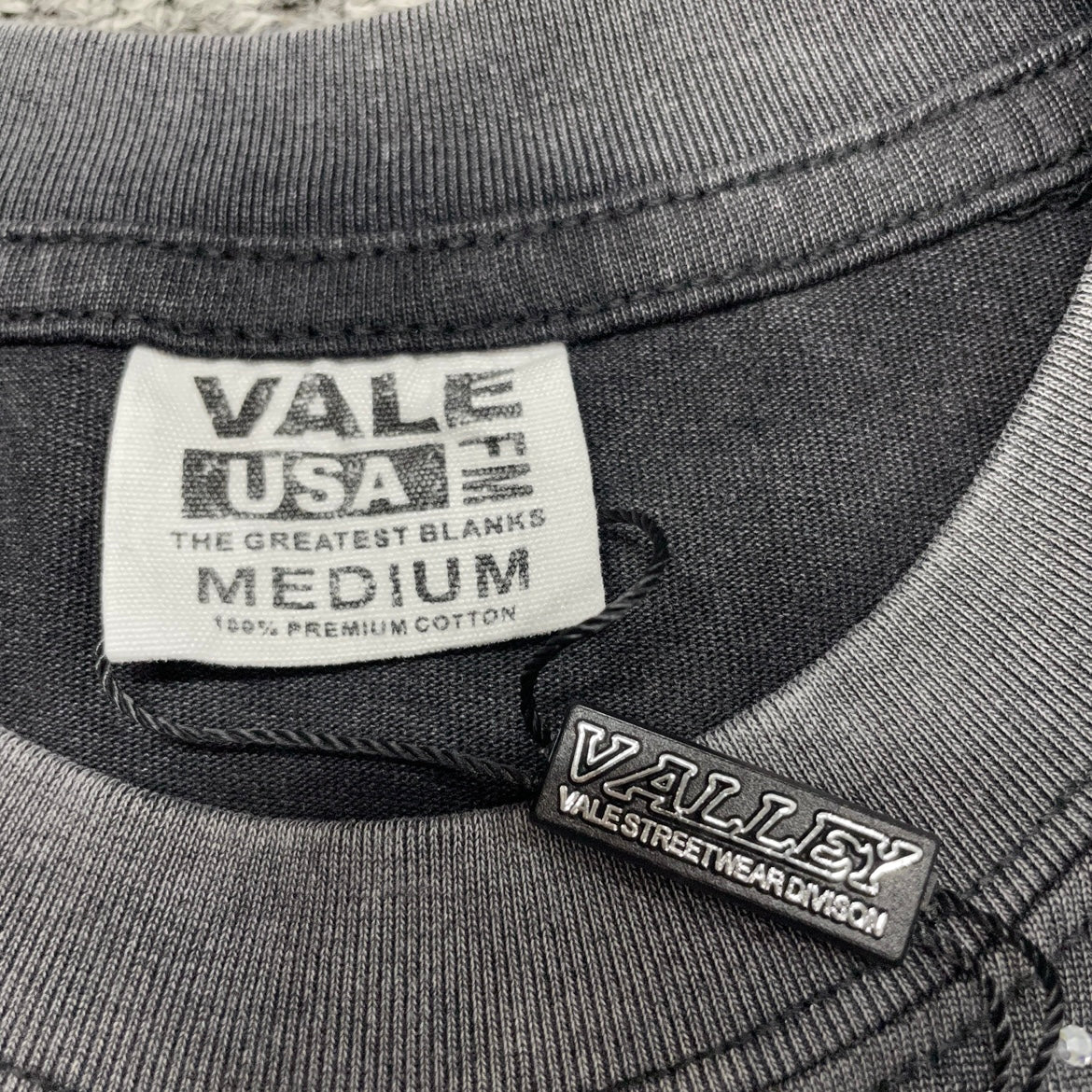 Vale Forever Iron Cross Bling Tee crew neck stitching detail
Vale Forever Iron Cross Bling Tee rhinestone neckline detail
Vale Forever Iron Cross Bling Tee branded neck label close-up
Vale Forever Iron Cross Bling Tee Black size label detail