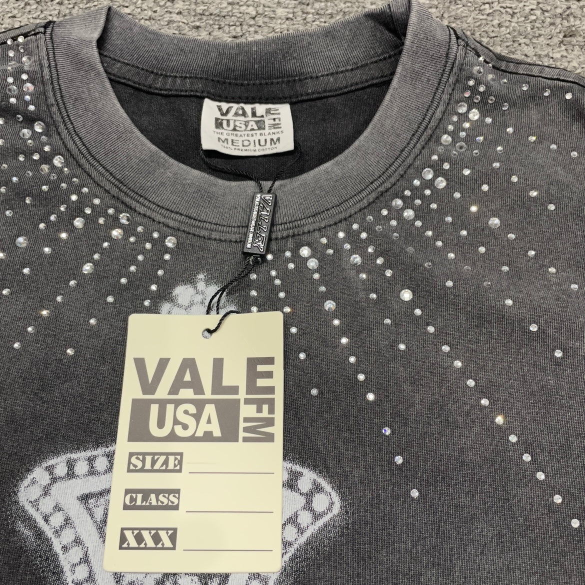 Vale Forever Iron Cross Bling Tee branded hang tag detail
Vale Forever Iron Cross Bling Tee rhinestone neckline detail