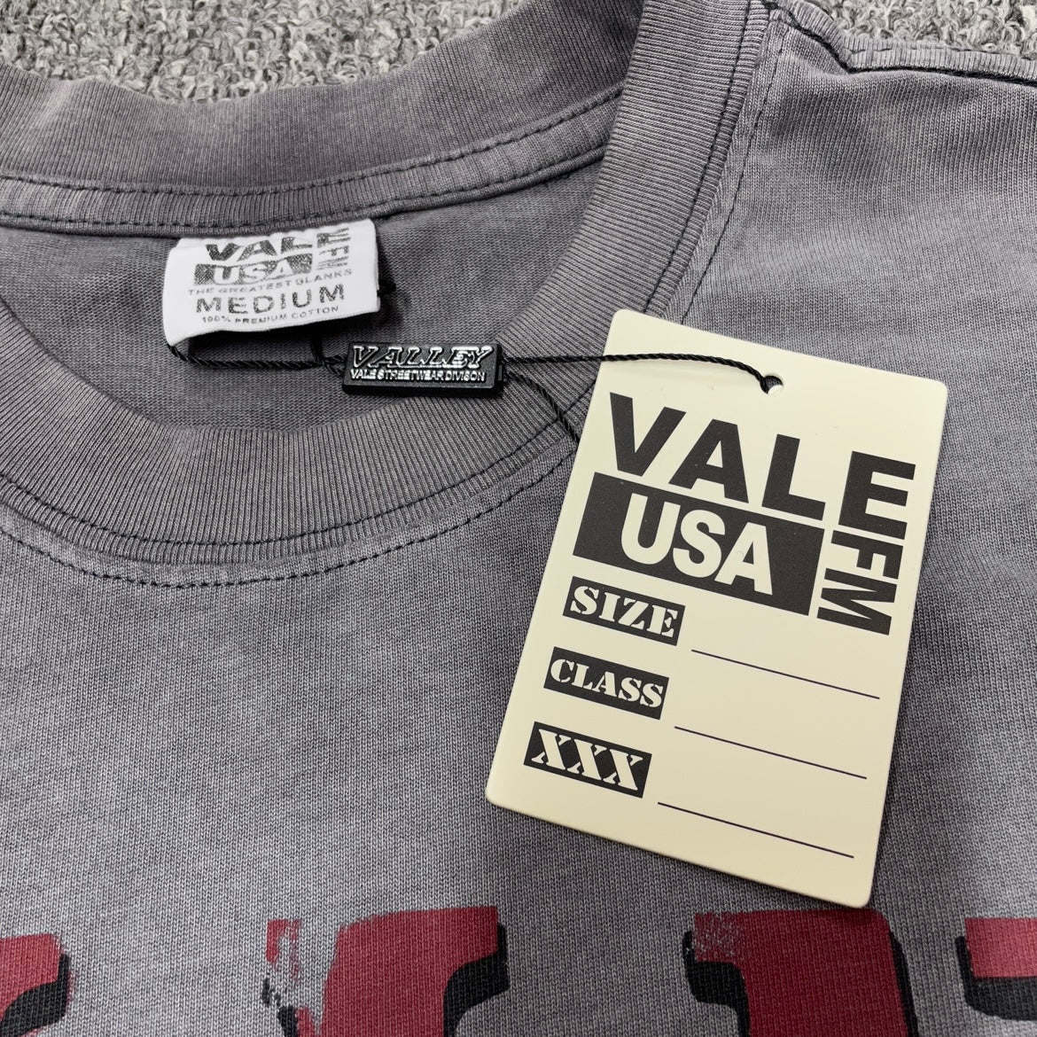 Vale Forever 199X Fest Tee crew neck stitching detail
Vale Forever 199X Fest Tee branded neck label close-up
Vale Forever 199X Fest Tee Slate size label detail
Vale Forever 199X Fest Tee branded hang tag detail