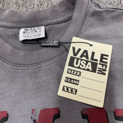 Vale Forever 199X Fest Tee crew neck stitching detail
Vale Forever 199X Fest Tee branded neck label close-up
Vale Forever 199X Fest Tee Slate size label detail
Vale Forever 199X Fest Tee branded hang tag detail