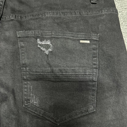 AMIRI Staggered Logo Distressed Skinny Jeans Black