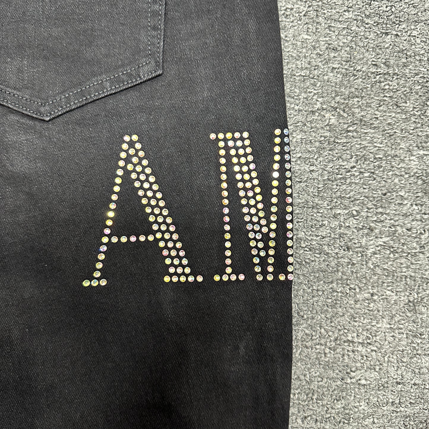 AMIRI Staggered Logo Distressed Skinny Jeans Black