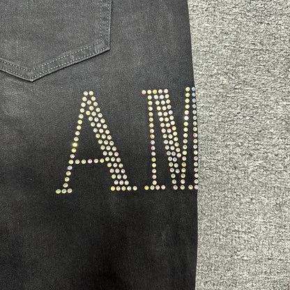AMIRI Staggered Logo Distressed Skinny Jeans Black