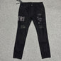 AMIRI Staggered Logo Distressed Skinny Jeans Black
