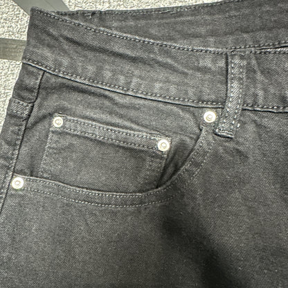 AMIRI Staggered Logo Distressed Skinny Jeans Black