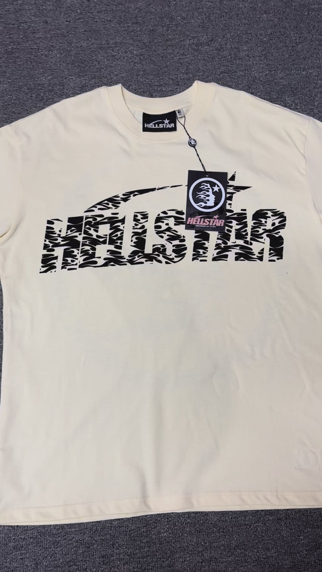 Hellstar Classic Logo Gel Print T-Shirt in cream front view with black flame-pattern wordmark