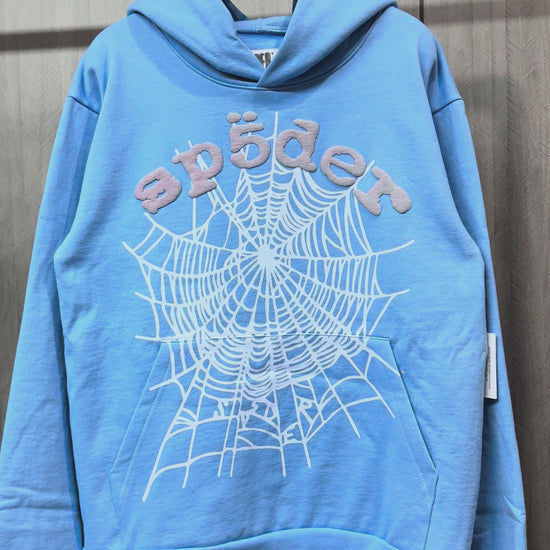 Sp5der OG Web V2 Hoodie Dusty Blue front view with raised grey logo and white spider web
