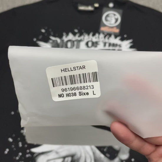 Hellstar Not of This Earth T-Shirt in black front view with oversized monochrome space character graphic