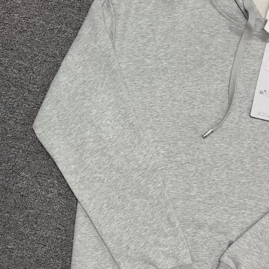 ALO Accolade Hoodie in Athletic Heather Grey front view with embroidered chest logo