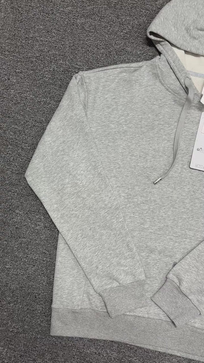 ALO Accolade Hoodie in Athletic Heather Grey front view with embroidered chest logo