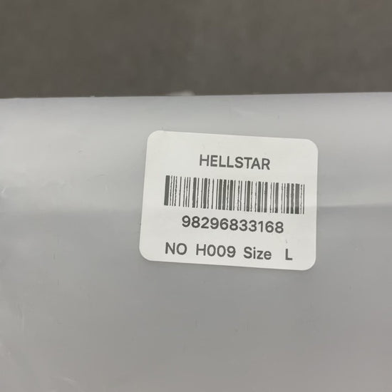 Hellstar Breaking News T-Shirt in white front view with oversized comic-style brainwashed face graphic