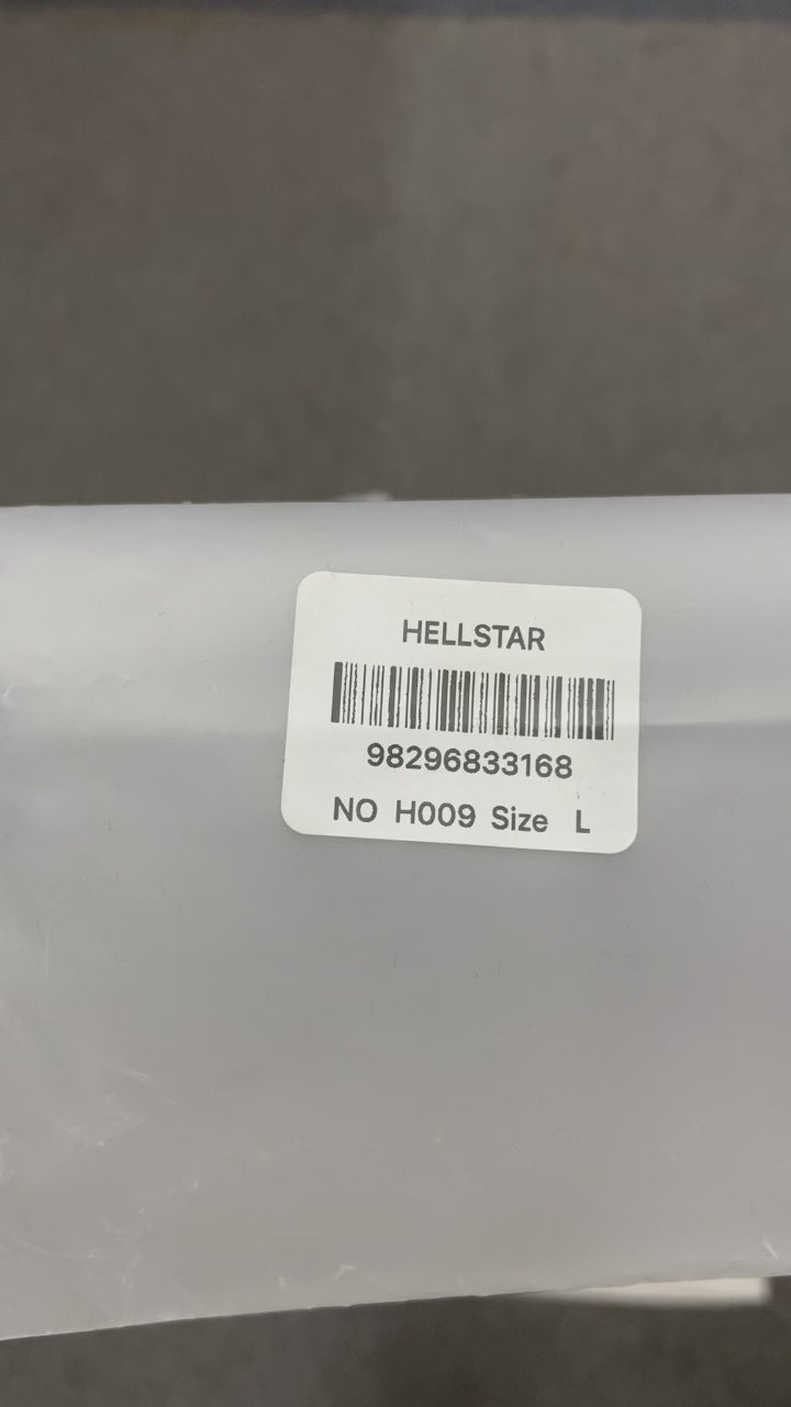 Hellstar Breaking News T-Shirt in white front view with oversized comic-style brainwashed face graphic