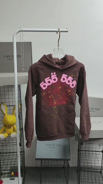 Sp5der Angel Number 555 Hoodie Brown front view with pink lettering, red web and yellow stars