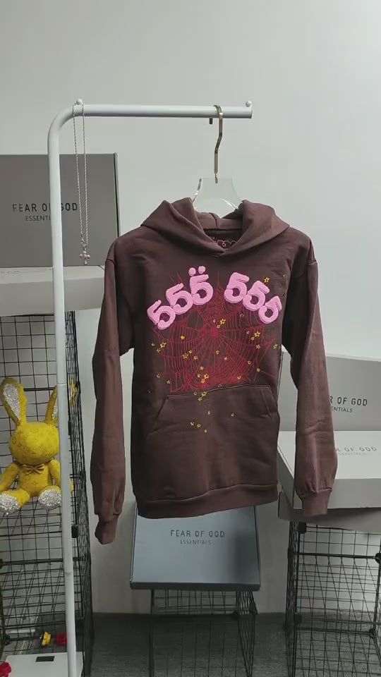 Sp5der Angel Number 555 Hoodie Brown front view with pink lettering, red web and yellow stars