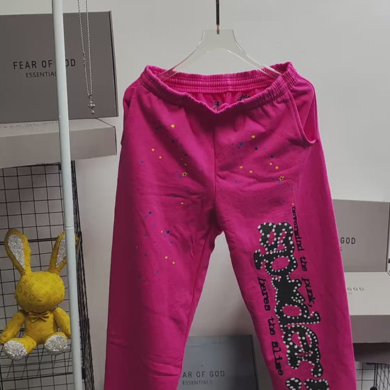Sp5der P*NK sweatpants pink back view with elastic waistband and cuffed hems
