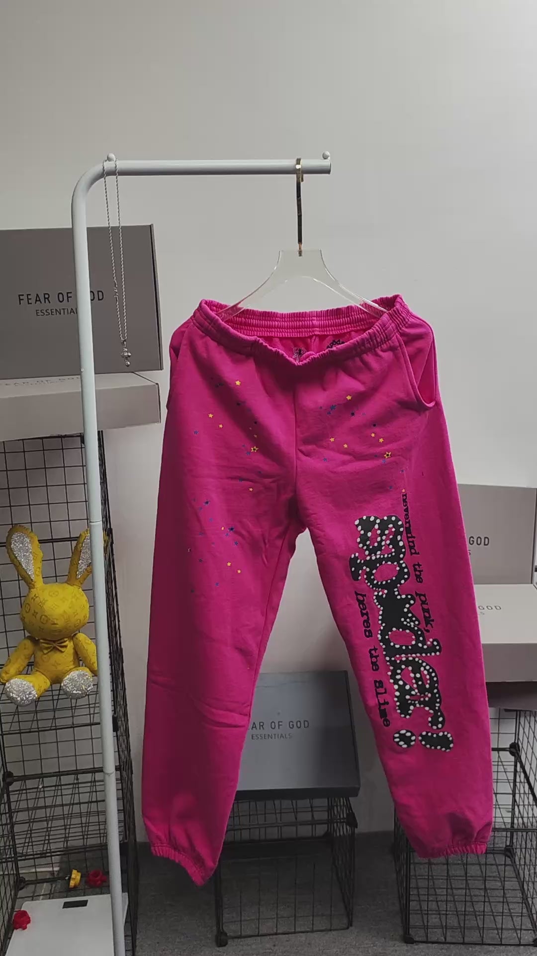 Sp5der P*NK sweatpants pink back view with elastic waistband and cuffed hems