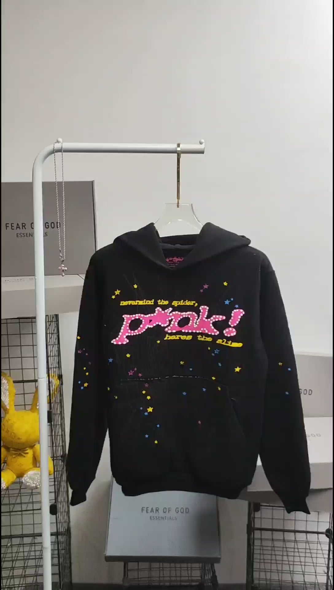 Sp5der P*NK Hoodie Black front view with raised pink lettering, spider web and multicolor stars