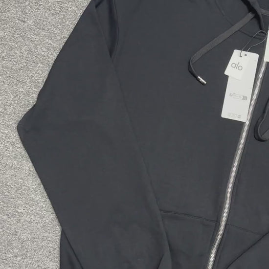ALO Accolade Full Zip Hoodie in Black front view with embroidered chest logo