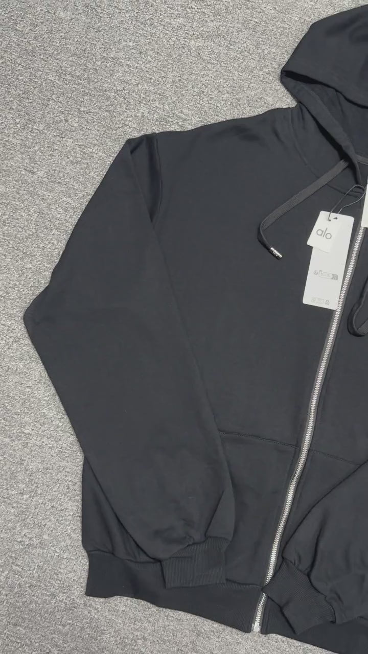 ALO Accolade Full Zip Hoodie in Black front view with embroidered chest logo