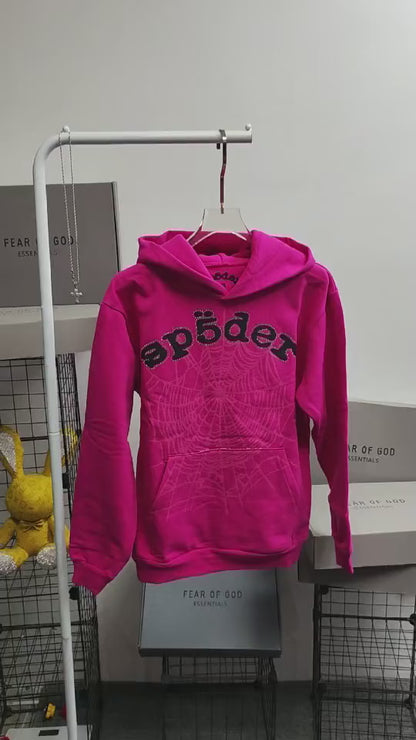 Sp5der Legacy Hoodie Pink White front view with black puff logo, rhinestone trim and tonal web graphic