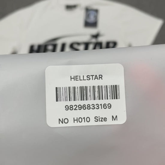 Hellstar Sports Logo T-Shirt in white front view with oversized black wordmark and shooting-star graphic