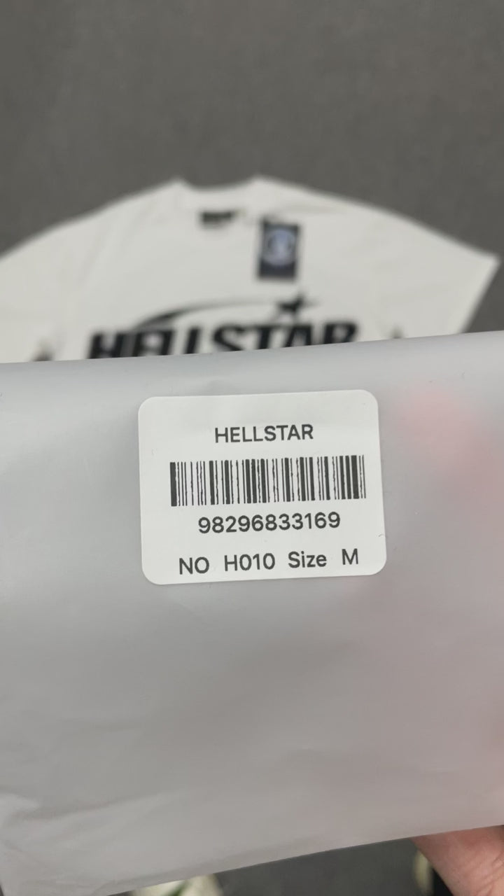 Hellstar Sports Logo T-Shirt in white front view with oversized black wordmark and shooting-star graphic