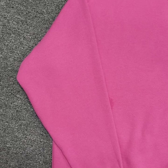 ALO Accolade Crew Neck Pullover in Paradise Pink front view with silver chest logo