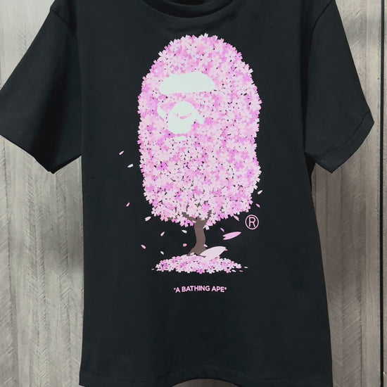 BAPE Pink cherry blossom graphic detail on black streetwear T-shirt