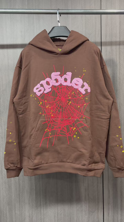 Sp5der Web Hoodie Brown front view with raised pink logo, red spider web and yellow stars